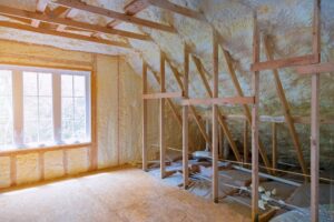 Thermal insulation a new house under the roof of air conditioner vents in new home construction on